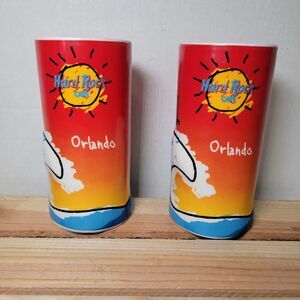Set of 2 Hard Rock Cafe Orlando Heavy 3-D Ceramic Glasses Surfer Stick Figure
